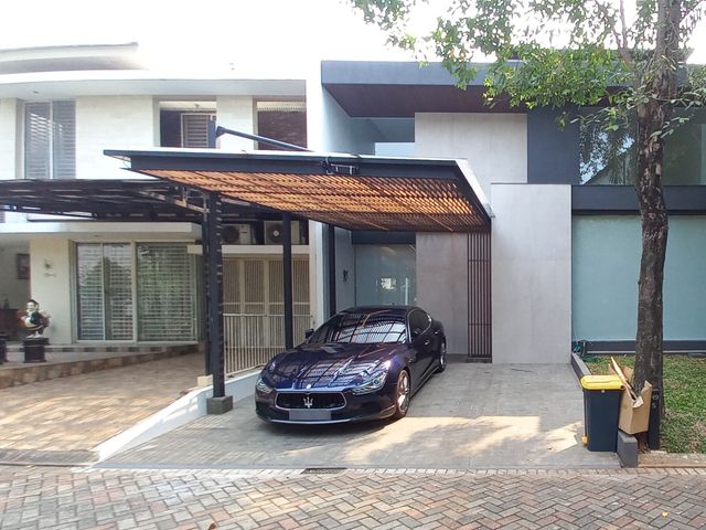 Rumah Modern di Lingkungan Asri Puri Botanica
