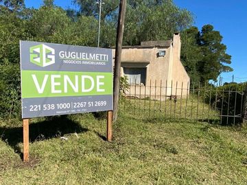 Hectárea en venta con vivienda principal y departamento