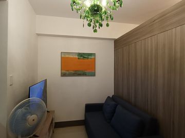 Fully-Furnished 1-BR condominium unit with balcony at Fame Residences