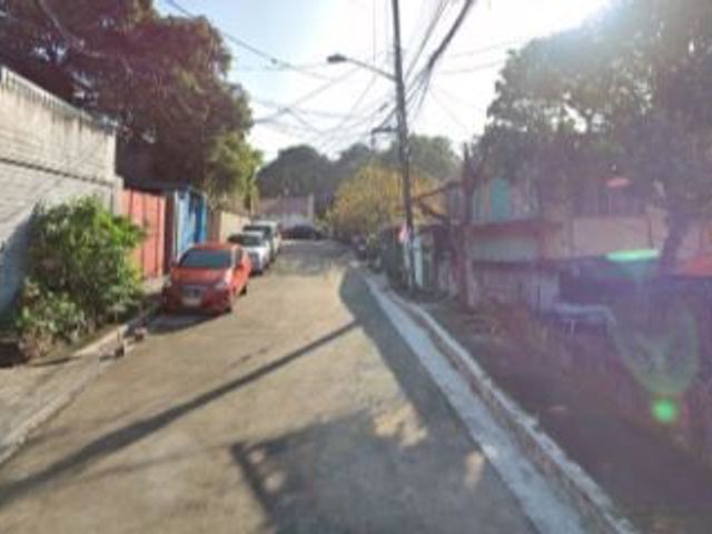 FOR SALE - Lot with Old House in Roxas District, Quezon City